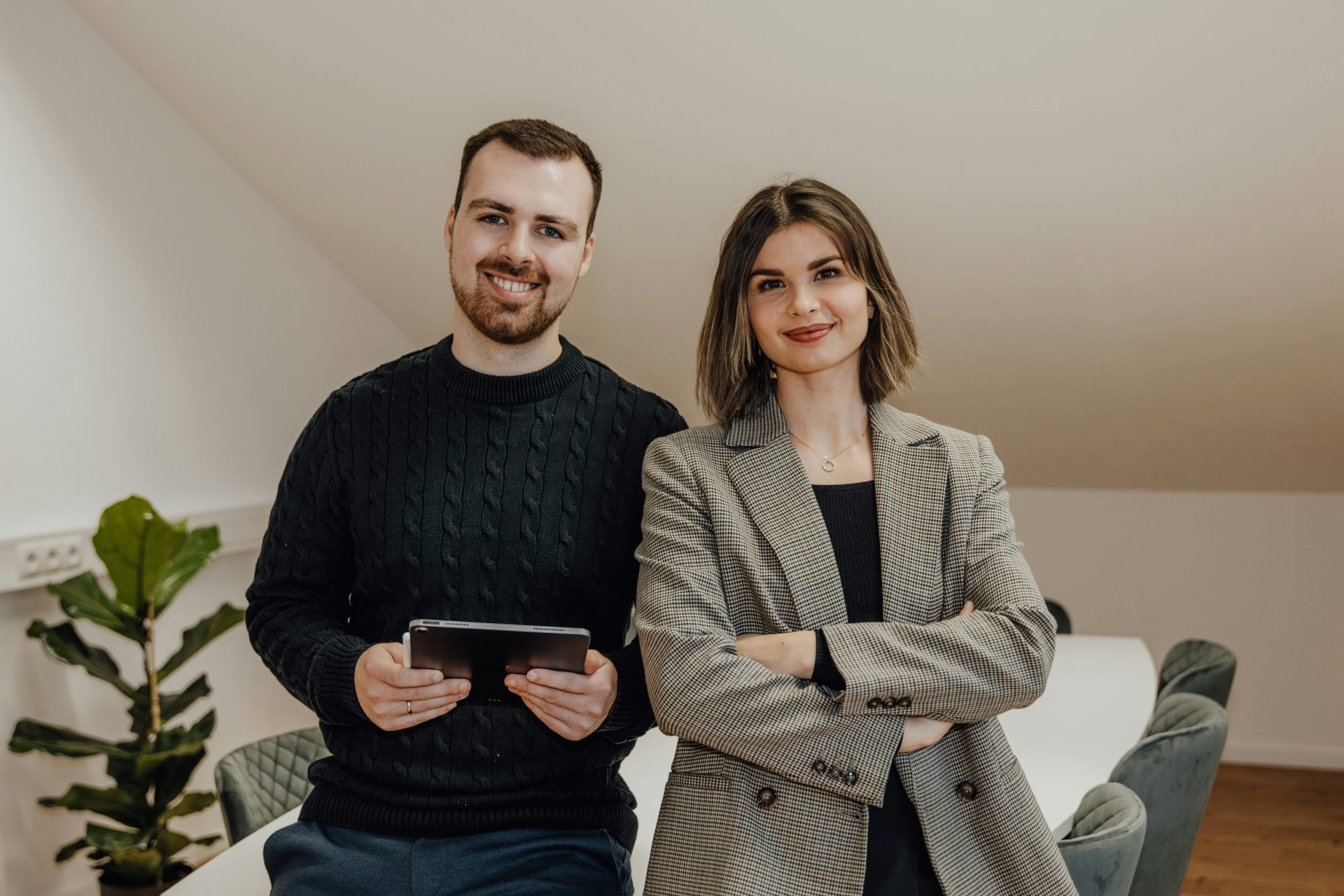 a man and a woman standing next to each other